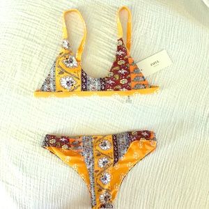 Yellow flowered two piece swim suit